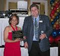 SILVAR President Mark Burns congratulates 2007-2008 FAREPA President Judy Lamar.