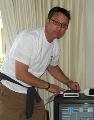 Brad Dodge programs a cable box for a senior homeowner in Saratoga.