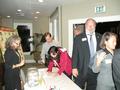 SILVAR Development Director Kelly Dadsetan checks members in, among them is SILVAR Board Director Gene Lentz.