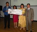 FAREPA presidents present $10,000 for Gawad Kalinga project in the Philippines, to build homes and a community for the poor in the Philippines.