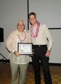 SILVAR 2010 President Jeff Bell congratulates 2010 FAREPA President Richard Miller.