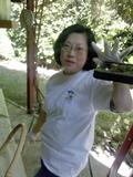 Wendy Wu gets ready to clean outside.