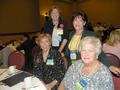 Standing are SILVAR Board Director Dante Drummond and Carolyn Miller; seated are Phyllis Carmichael and SILVAR Board Director Susan Tilling