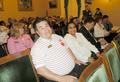 Sue Bose and other REALTORS&reg; patiently wait for another legislator.
