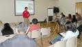 Jimmy Kang talks to potential buyers about "How to Qualify for a Loan."