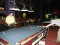 Steve Kim and Tom McEvoy try their hand at pool.