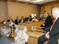 Senator Simitian listens as SCCAOR's Carl San Miguel discusses an issue.