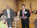 Bo Chang introduces Assemblymember Paul Fong.