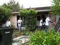 In Los Altos, here are RSVP volunteers Bernie Sinsay, Tom Martin, Stella Zhu, Nick French trimming bushes and washing windows for a senior homeowner.