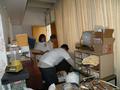 In the home of a Mountain View senior, volunteers clear the clutter - Alfredo Ramirez, Nisha Sharma and Marli Szpaller