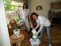 All done washing windows, Gladys Morais and Lucy McGuire get ready to pack up and head for the next home.