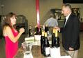 Kathy Hearn Bosse explains the different types of wine to Joe Merkert.