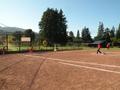 Practicing on the field before the game begins.