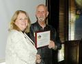 SILVAR President Suzanne Yost receives the Honorary Filipino award.