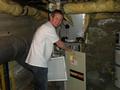 CT Harris  replaces a filter for a Los Gatos senior homeowner.