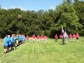 Teams gather for the Pledge of Allegiance and Star Spangled Banner.