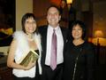 Amy Sung and Michael Repka from DeLeon Realty with SILVAR Global Business Council Chair Jennifer Tasto.