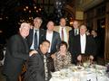 The Coldwell Banker team - Joe Brown, Matt Paulo, Doug Evans, Bill Rehbock, Pat McKinney, Ted Lascola, and seated are John Scaglione and Nina Yamaguchi