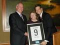 Paul Cardus and Suzanne Yost thank Jeff Bell, 2012 Region 9 Chair.