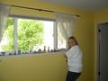 Barb Werner gets ready to dust knick knacks and wash windows.