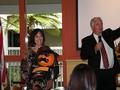 Diane Chandler of Alain Pinel Realtors shows off this pirate pumpkin as Jim Hamilton starts the bidding.