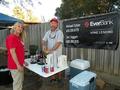 Board Director Chris Isaacson mans the beverage booth.