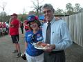 SILVAR President Carolyn Miller went out of her way to show she was neutral in this game, sporting both red (650) and blue (408) colors. She is pictured here with NAR Director John Tripp.
