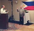 Milpitas Mayor Jose Esteves administers the oath of office to 2014 FAREPA President Paul Stewart.