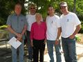 Owen Halliday, Dennis Bower, Carlos Padilla and Jimmy Nappo with a Los Altos senior homeowner
