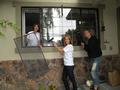 In Menlo Park, Rebecca Johnson, Tamara Pulsts and Karen Fryling get ready to wash windows for a 78-year-old homeowner.