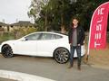 Seth Clark of Tesla displays this beautiful vehicle, which Moise Nahouraii later won the opportunity to drive for a day.