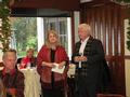 Joe Brown thanks Nancy Domich to her help in organizing the second annual pumpkin auction.
