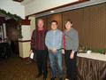 On behalf of the Silicon Valley Association of Realtors' Los Altos/Mountain View District, David Kim and Suzanne O'Brien presented a check for $1,200 raised from member donations at the district's November Legal Update, to Tom Myers (far left), executive 