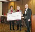 On behalf of the Silicon Valley Realtors Charitable Foundation, charitable foundation trustee Susan Sweeley presented a check for $2,500 to Judy Hannemann, board chair for JustREAD, a cross-generational program composed of retired professionals in the Los