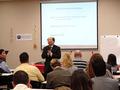 Master Y.C. Sun explains the principles of feng shui to members.