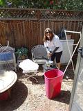 Grail Nitsch about to blow leaves and debris for a senior homeowner.