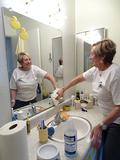 Cleaning a bathroom mirror