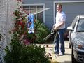 Frank Quinn takes care of more yard work.