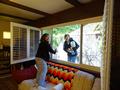 In Los Gatos, Olivia Gray and Terri Bertrand wash windows for a 90-year-old senior homeowner.