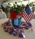 Centerpieces nicely decorated in red, white and blue.