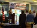 Tina Kyriakis sings The Star-Spangled Banner.