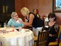 Charitable Foundation trustee Susan Sweeley confirms a member's bid.