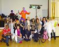 All costume contest participants gather together.