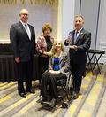 SILVAR Executive Officer Paul Cardus, NAR Director Leannah Hunt, President Chris Isaacson and President-elect Karen Trolan accept the Platinum Award for Global Achievement for SILVAR's Global Business Council.