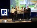 CREBA leadership and NAR president's Liaison to the Philippines Jennifer Tasto accept their award.