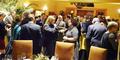Guests mingle before dinner.