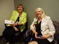 Mary Kay Groth and Suzanne Yost chat while waiting for our legislators.