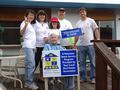 Lin-Lin Tsou-Otani, Cindy Legacy, Barbara Miller, Rick Brown and Eric Temple pose with a Sunnyvale senior who hated to see them leave.