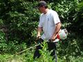 Jeff Beltramo with the weed whacker.