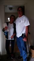 Desiree Docktor and David Gray get ready to help a Palo Alto senior homeowner.